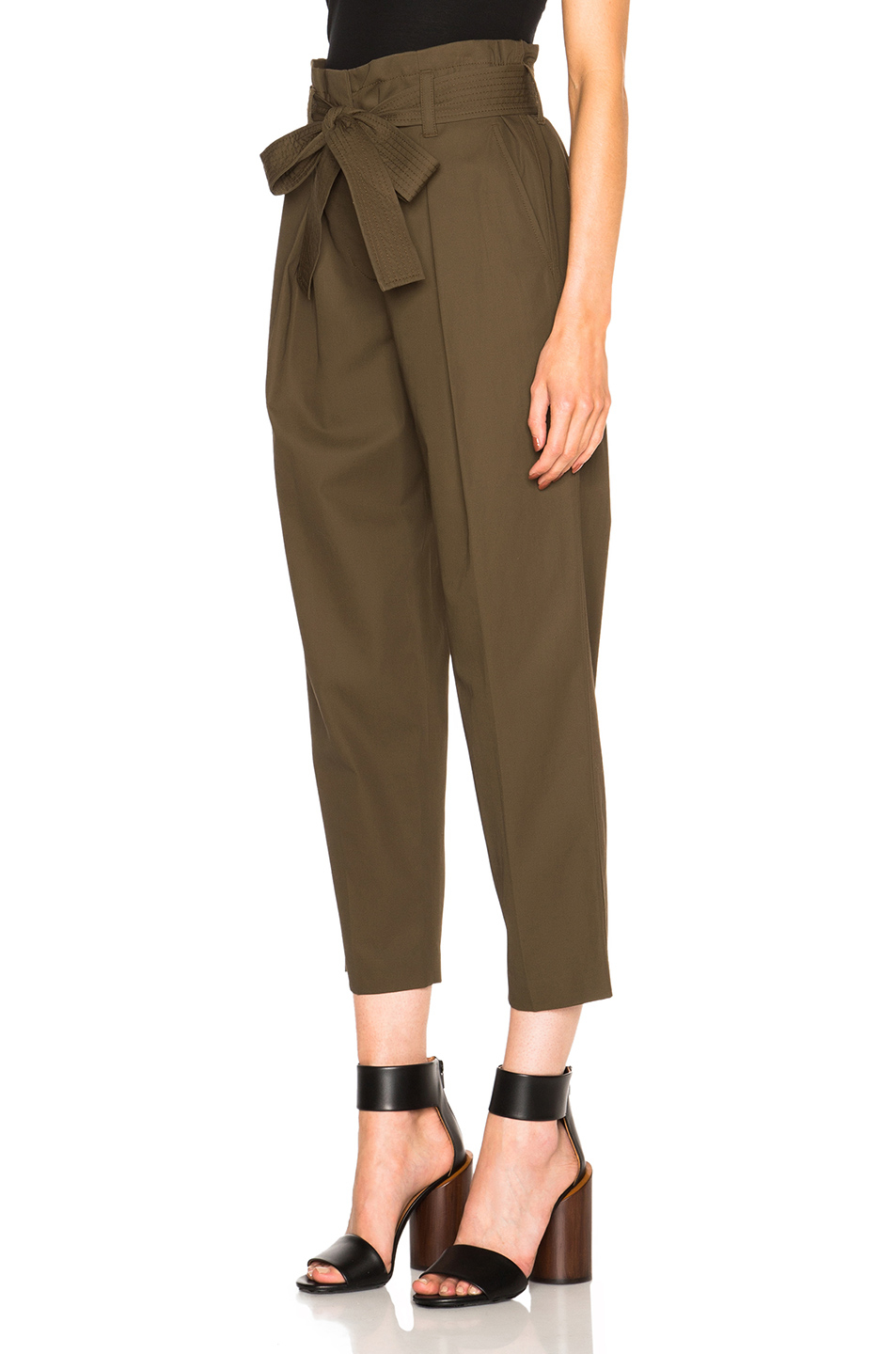 green paper bag trousers