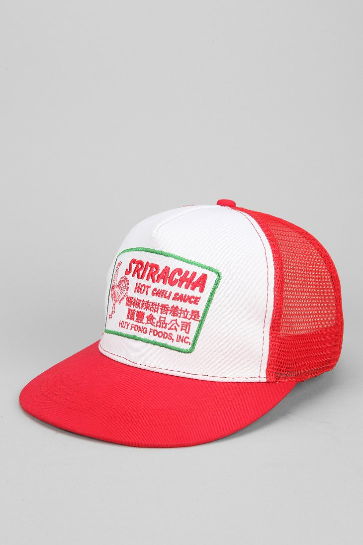 men red trucker hat