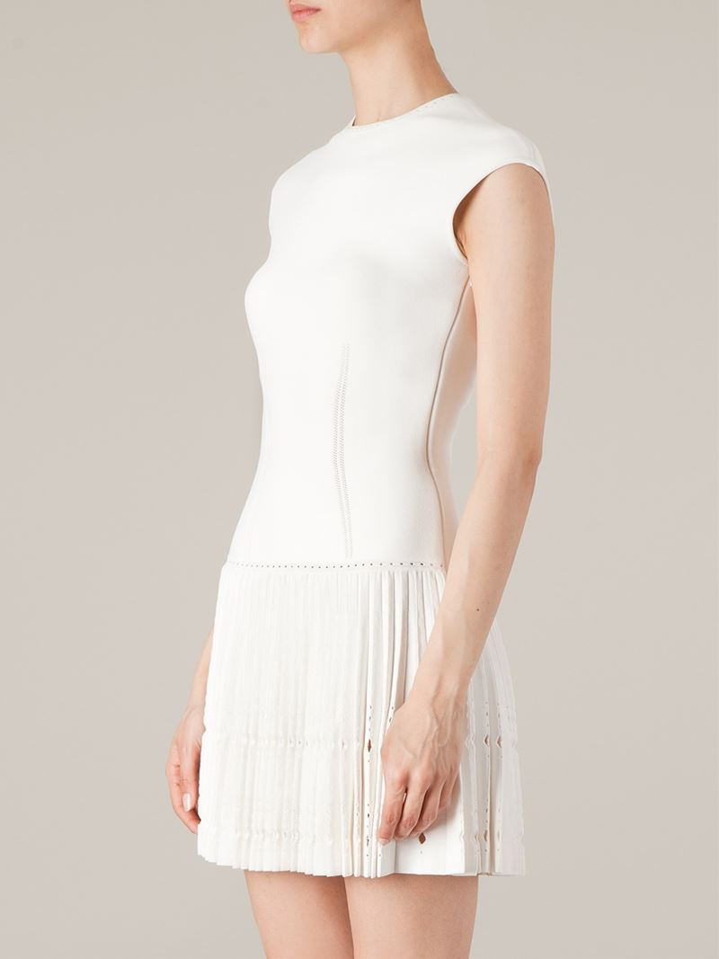 white dress with pleated skirt