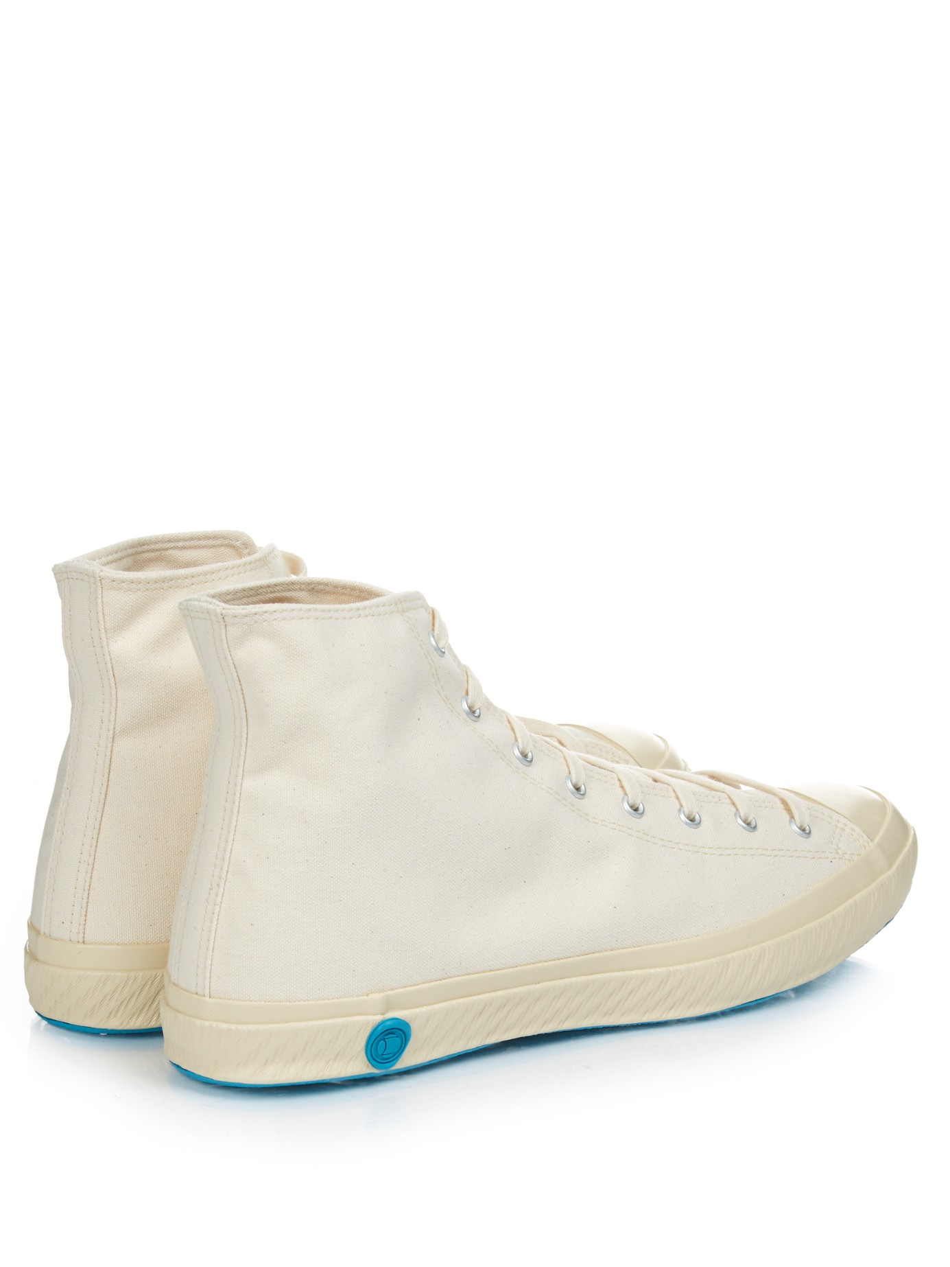 cream canvas trainers