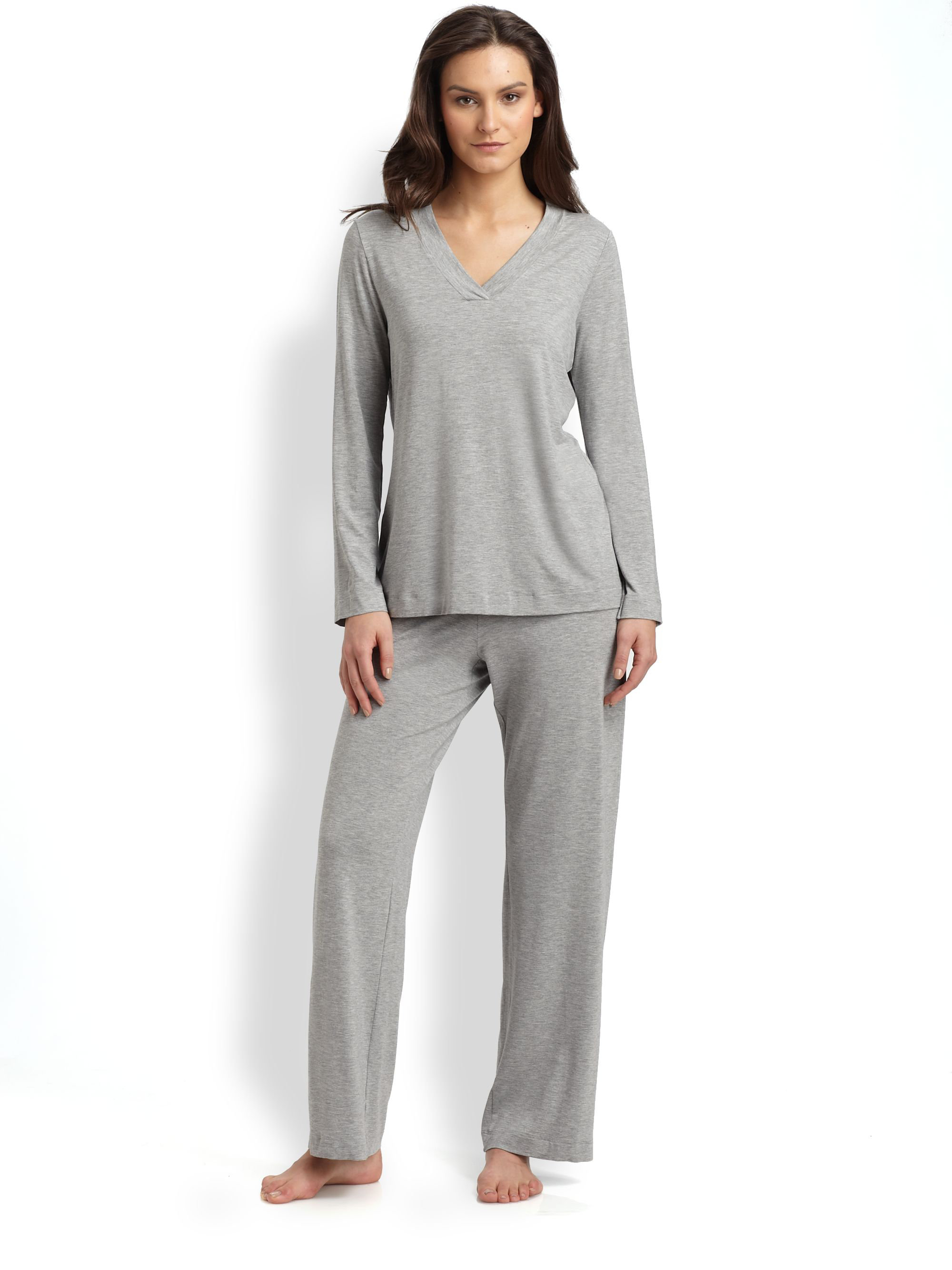 Long sleeve pjs This cozy pajama set features a long sleeve, button front top with a beautiful printed floral design, while the coordinating bottoms feature a comfortable elasticized waist.