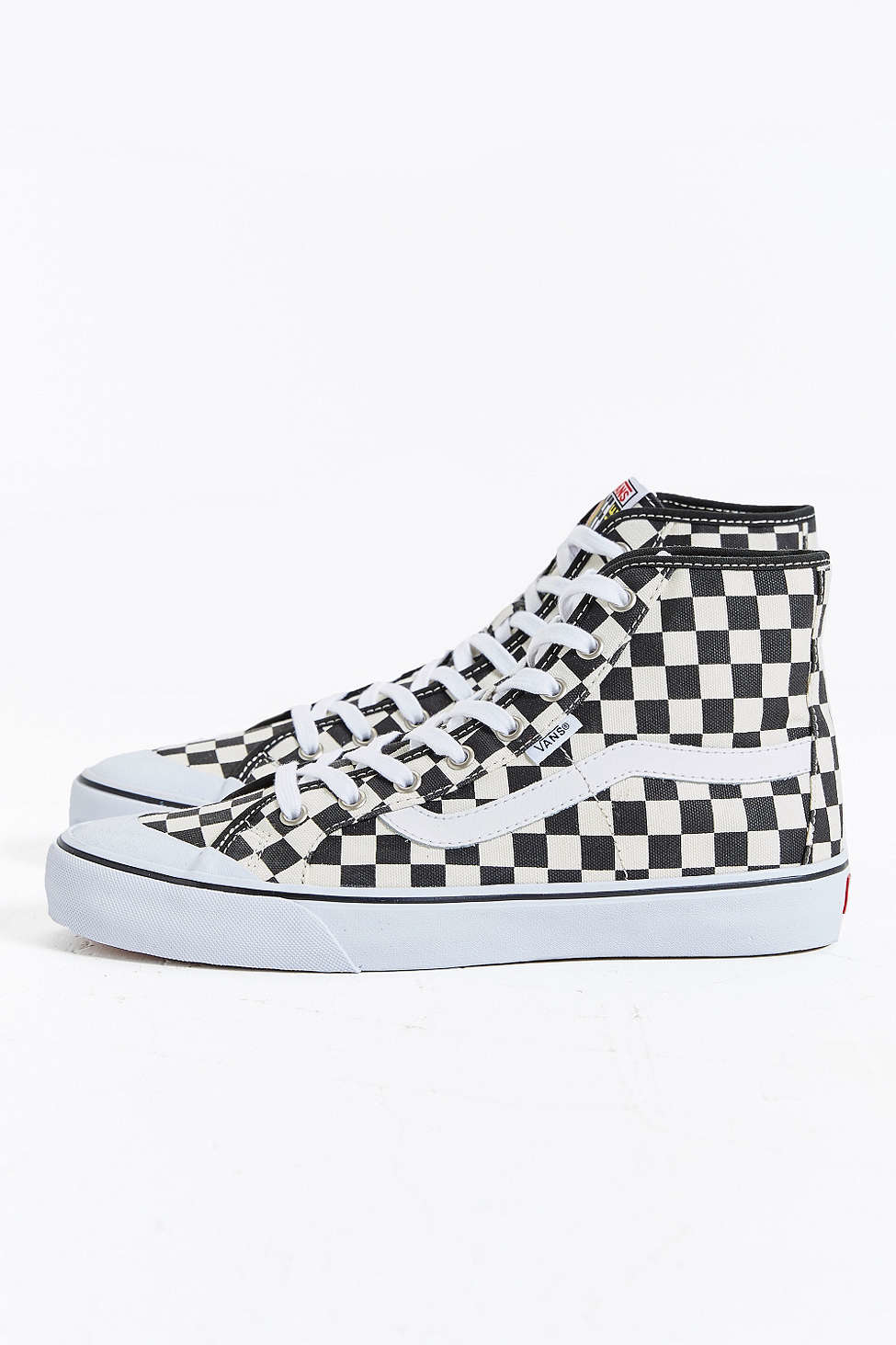 black and white checkered high top vans
