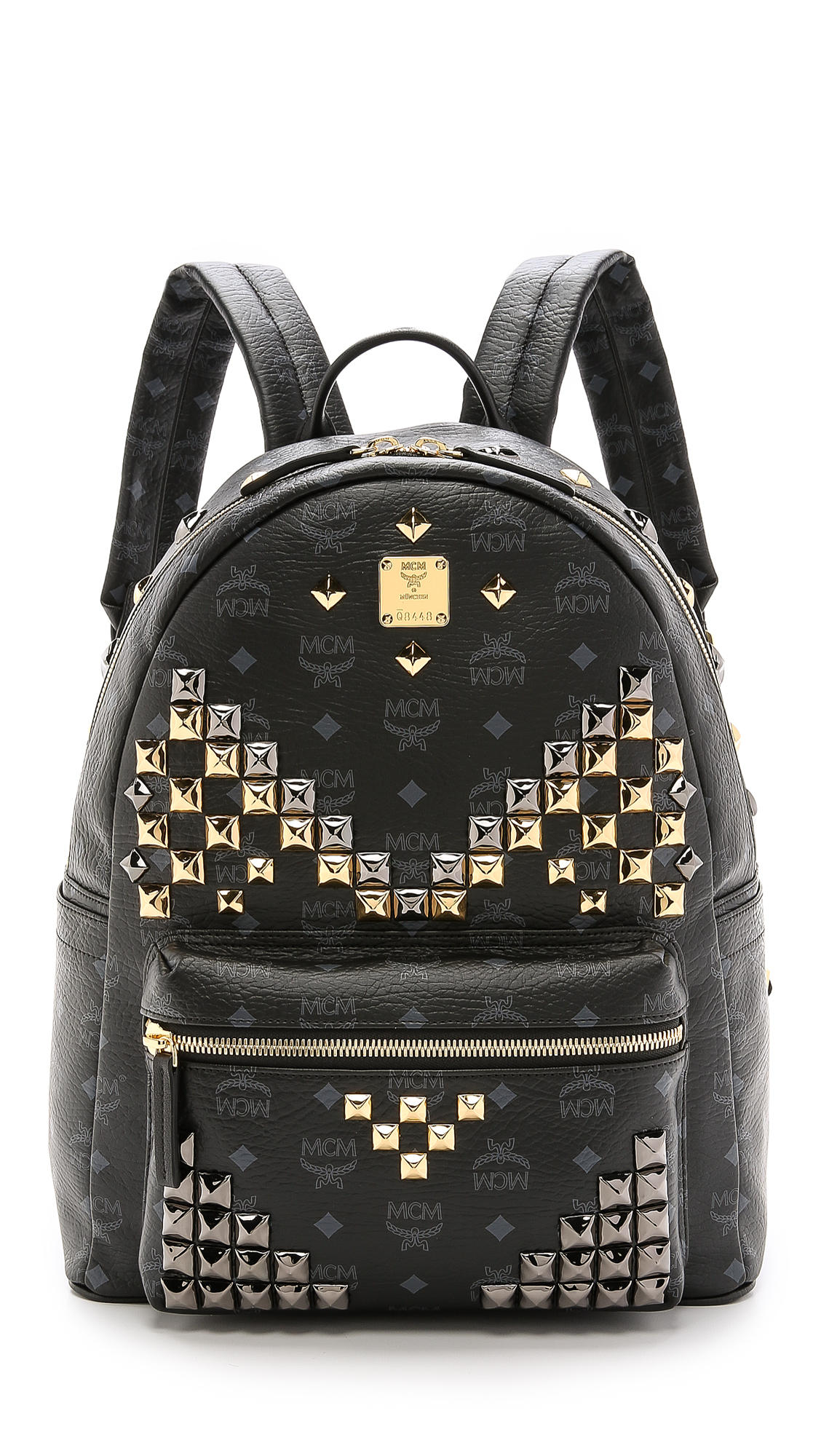 black mcm backpack with studs