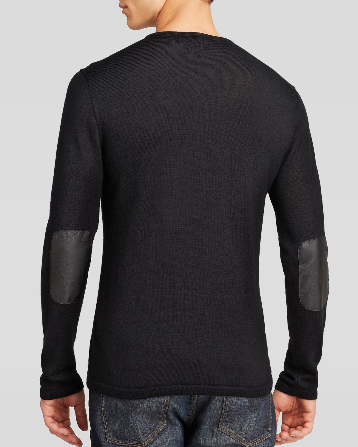 black sweater with elbow patches