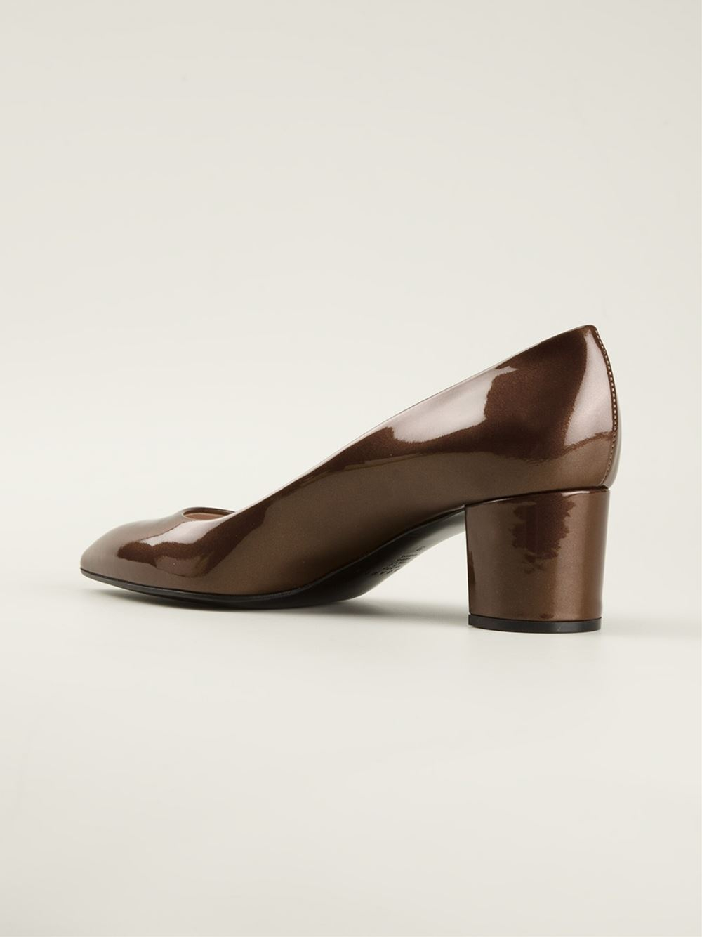brown and white pumps