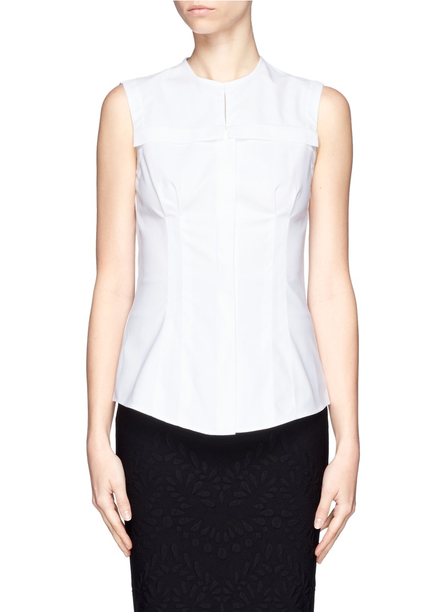 Sleeveless white peplum top Color/Pattern: White Multicolor Lace-Up Corset-Style Peplum Detailed With Stripes Choker Neckline Sleeveless Banded Waist Racer Back Peplum Hem Hidden Back Zipper Closure Measurements: 32In In Circumference At Bust; 22In From Shoulder To Hem; Taken From A .