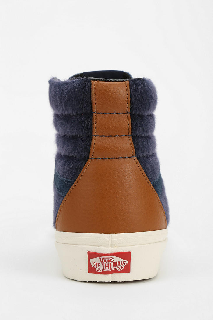 blue and brown vans high tops