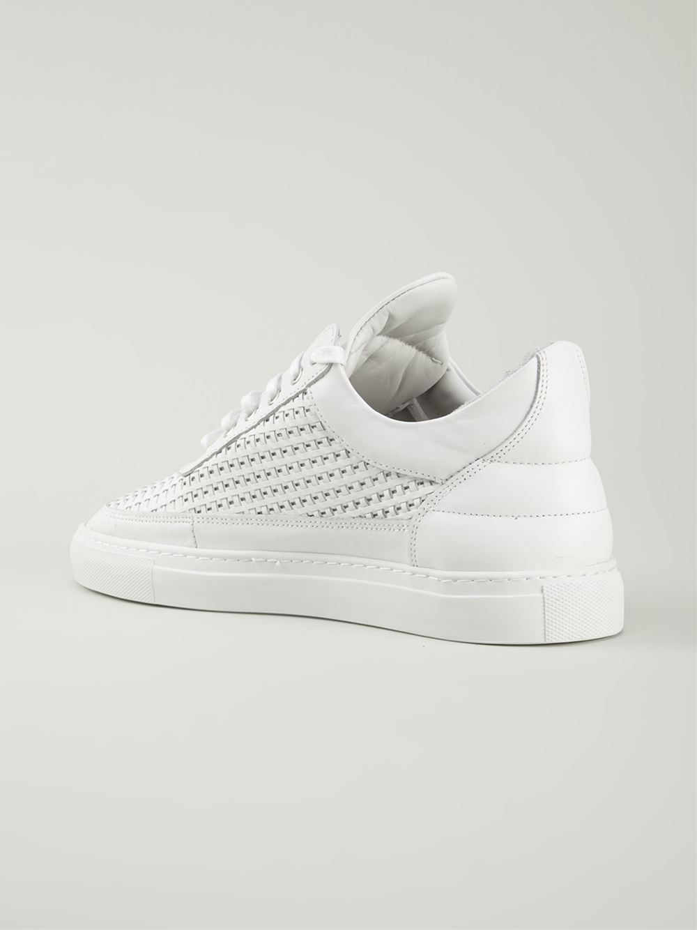 white mid top trainers