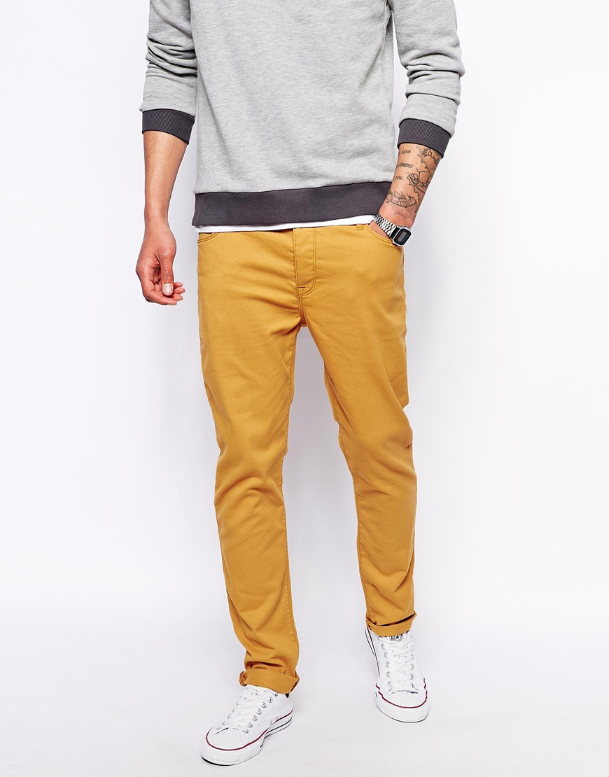 mustard colored skinny jeans