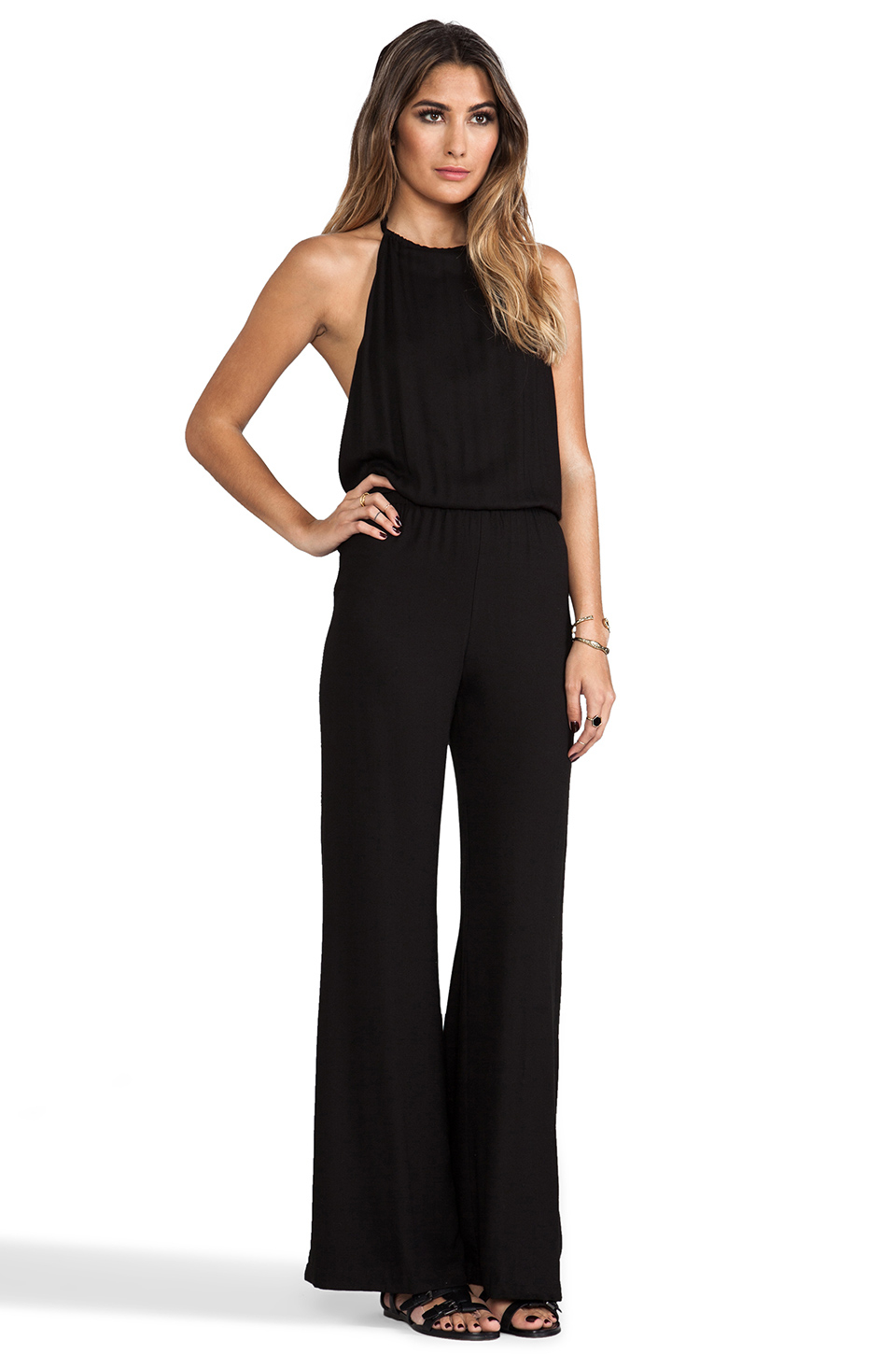 Open back jumpsuit This wide leg jumpsuit is all business in the front, while the open back is ready to report2day.ml back closureElastic waistCrepe wovenOnline only.