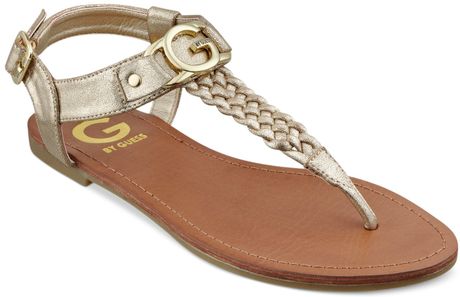 By Guess Women'S Lyrikk Flat Thong Sandals in Gold
