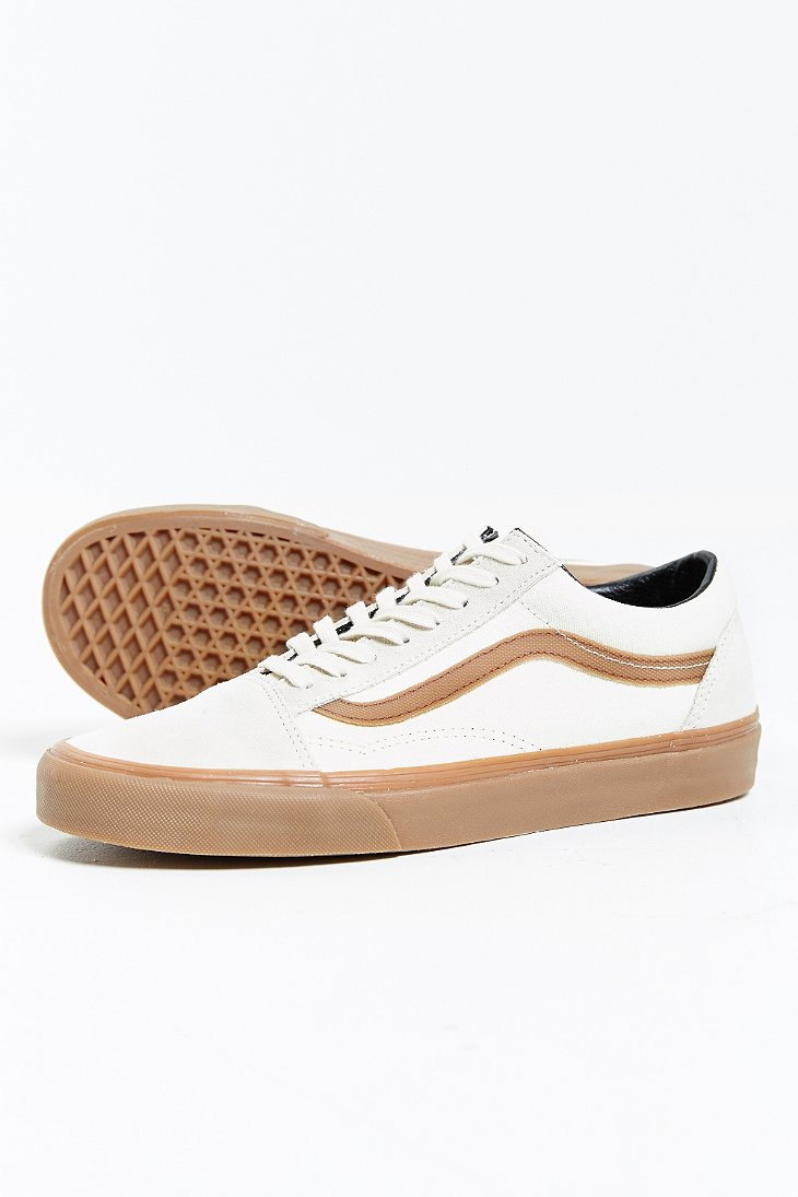 cream colored old skool vans