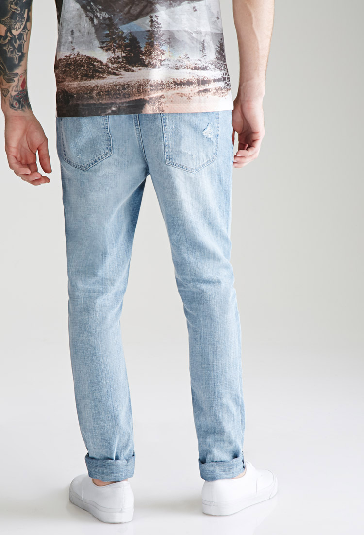 distressed faded jeans