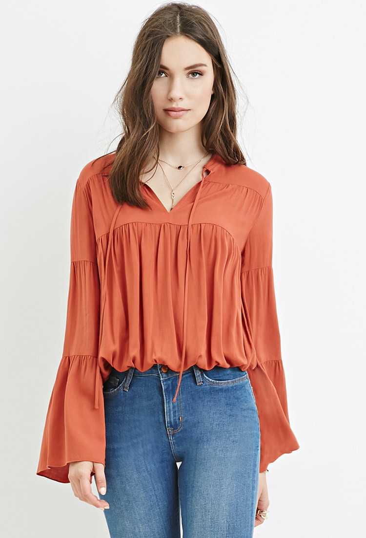 orange peasant top