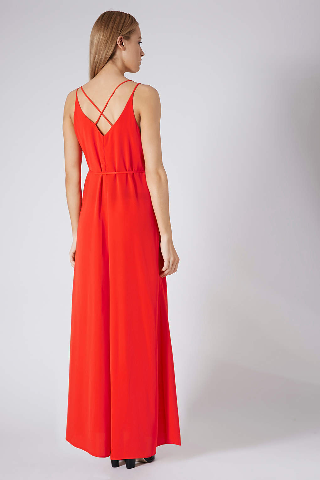 red strappy cross back fishtail maxi dress