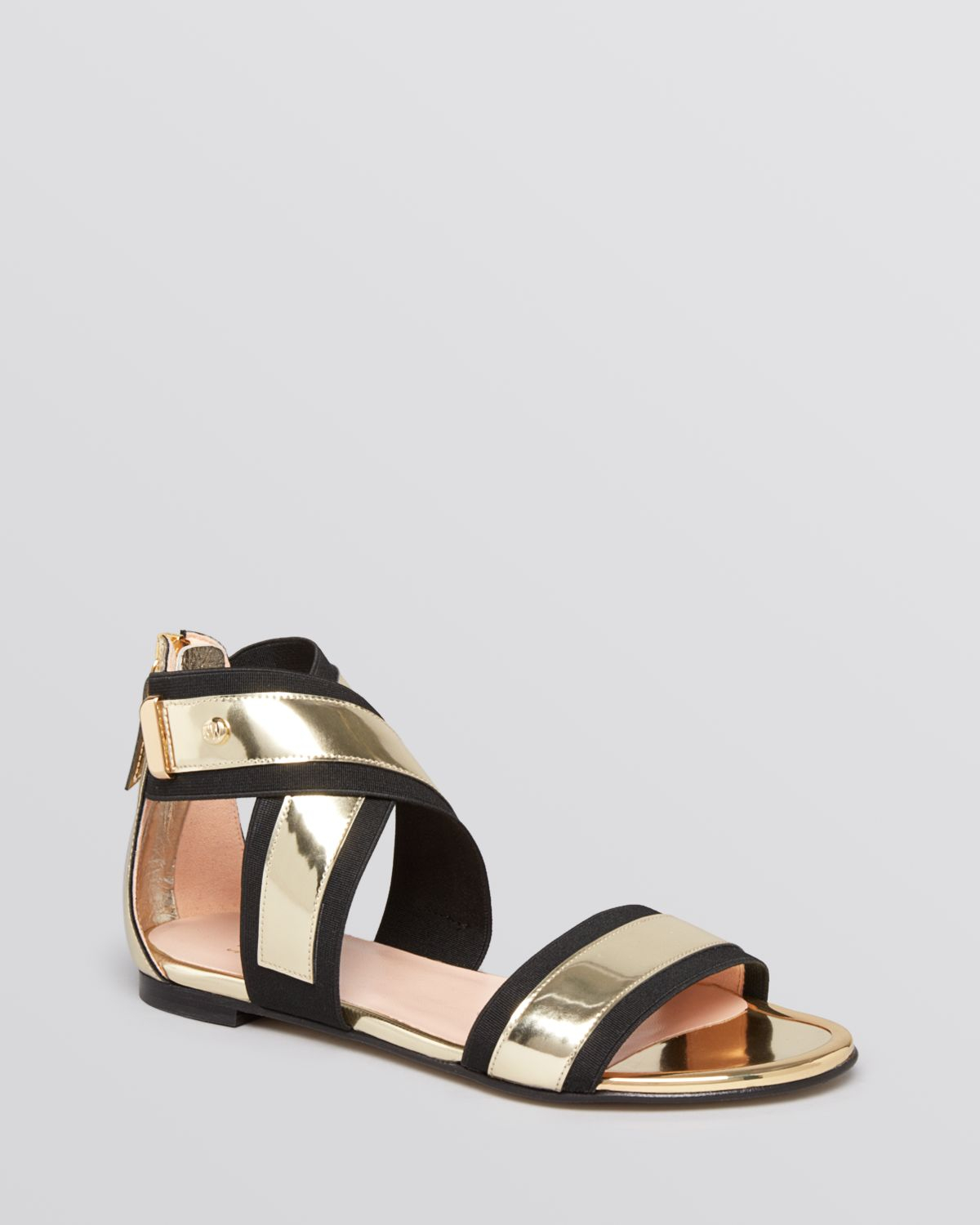 black flat sandals with gold studs