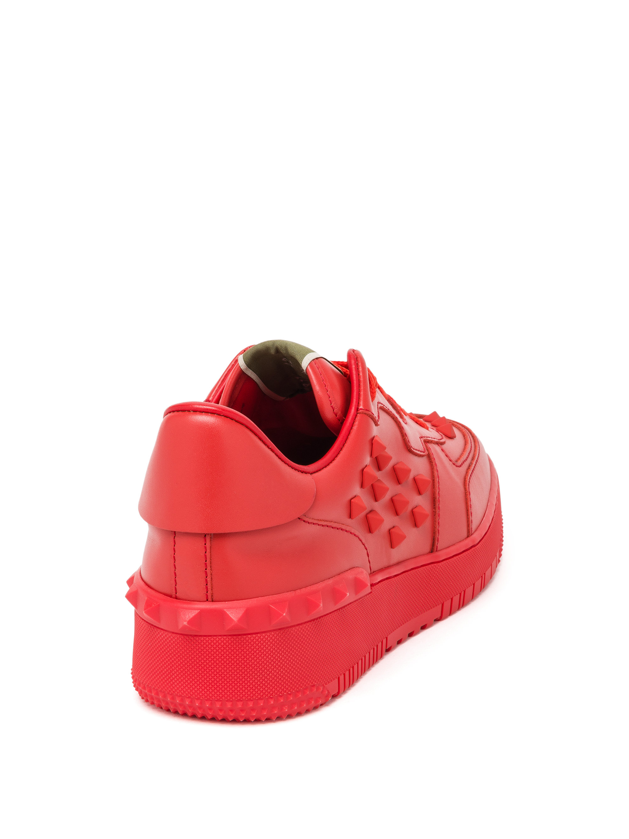 red studded sneakers