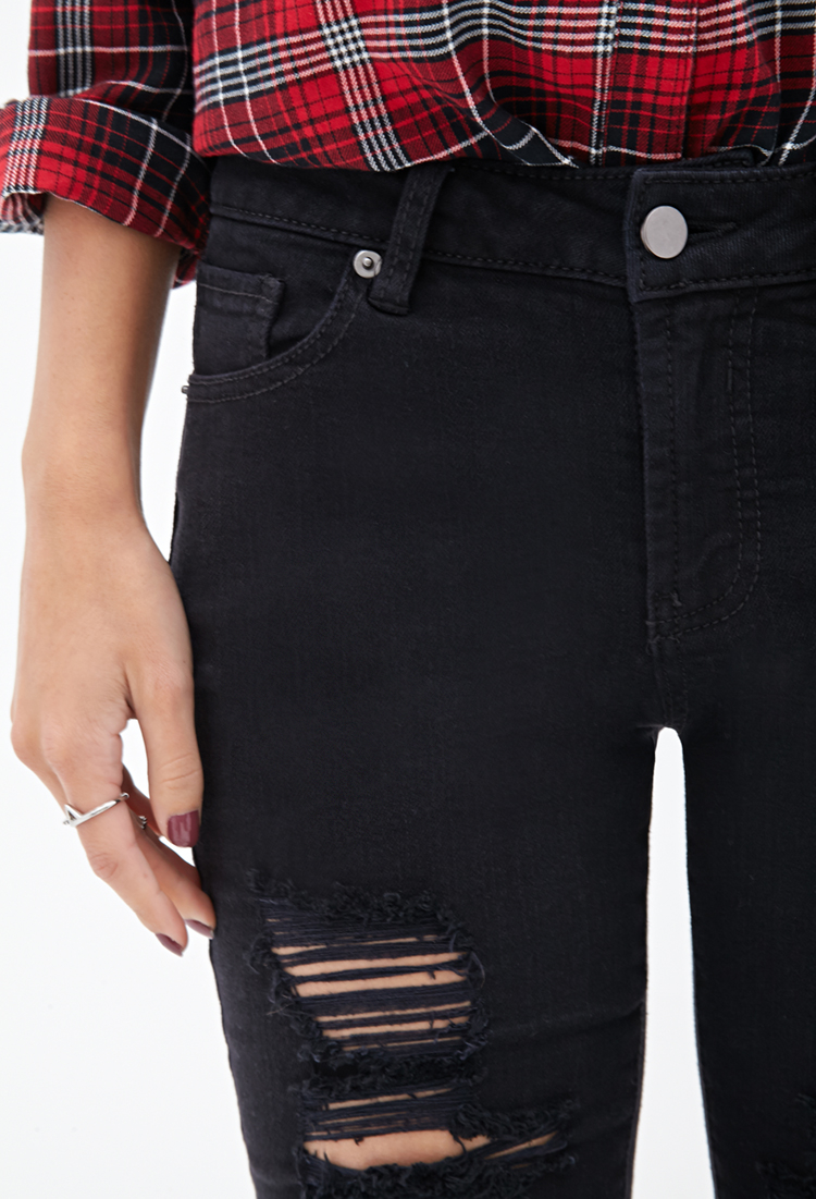 low rise black ripped skinny jeans
