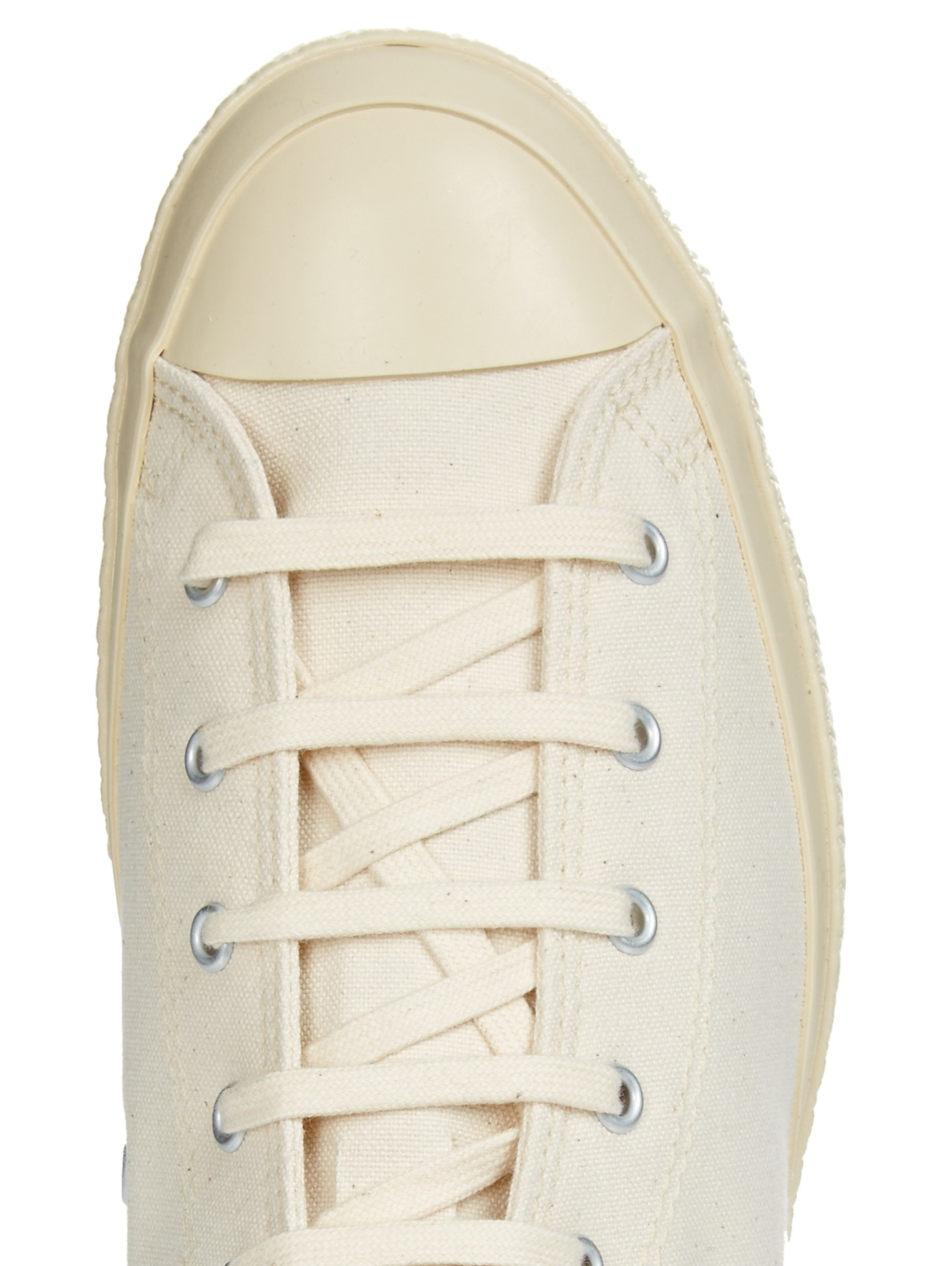 cream canvas trainers