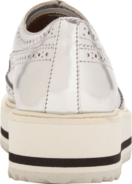 prada wingtip sneakers