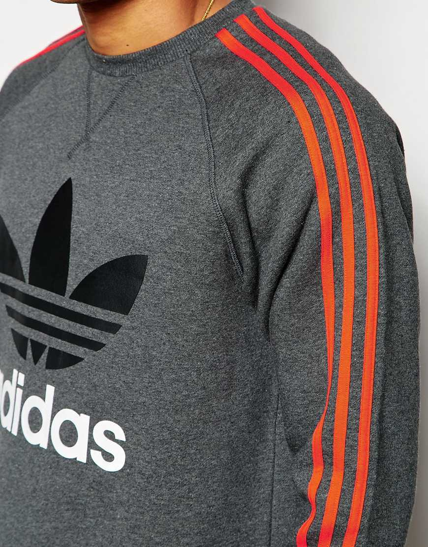grey and orange adidas shirt