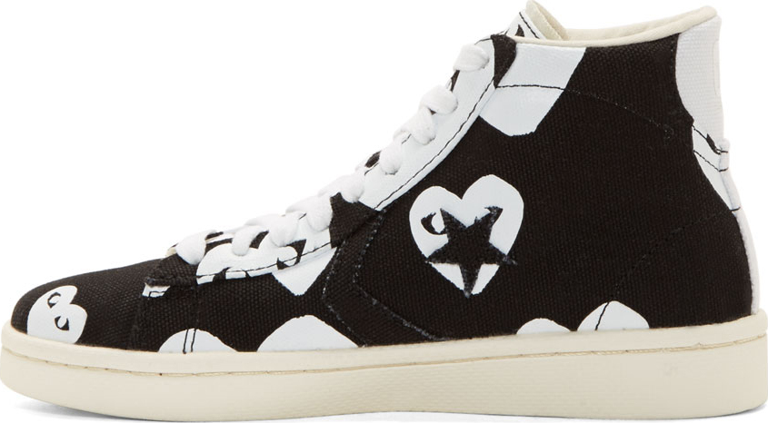 comme des garcons converse white with black hearts