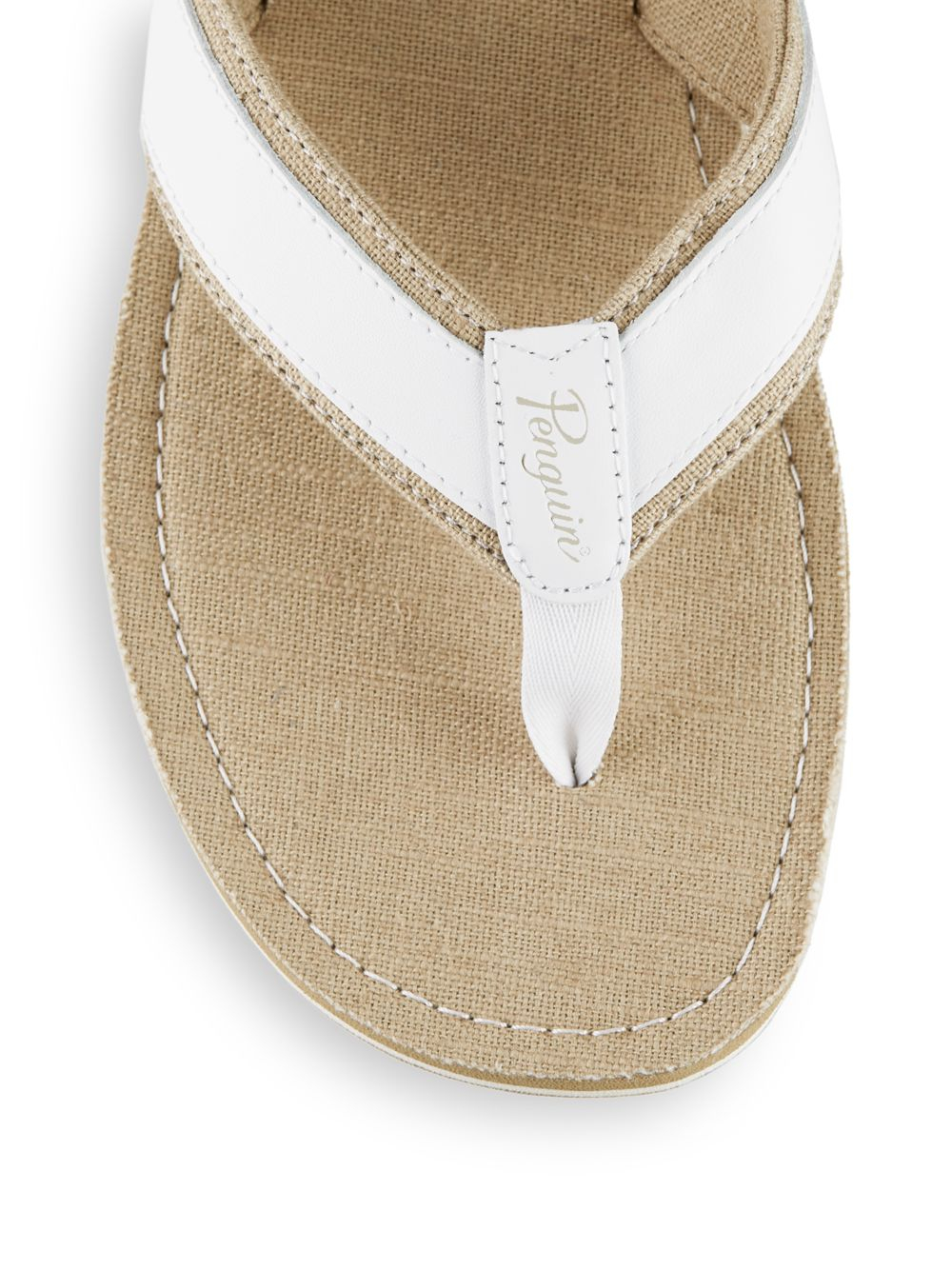 white canvas flip flops