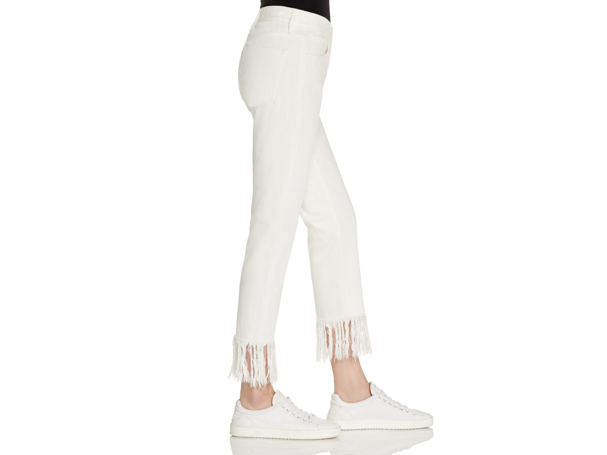 white fringed jeans
