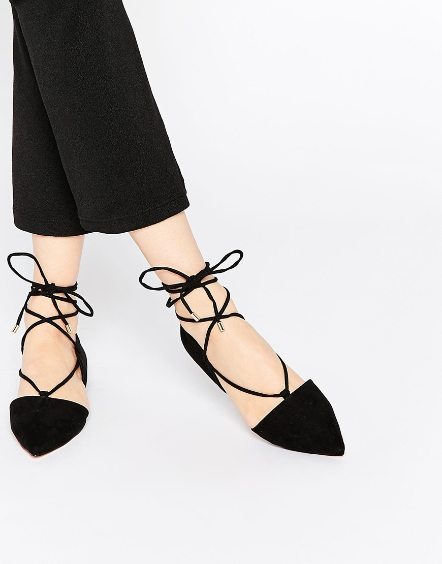 black pointed lace up flats