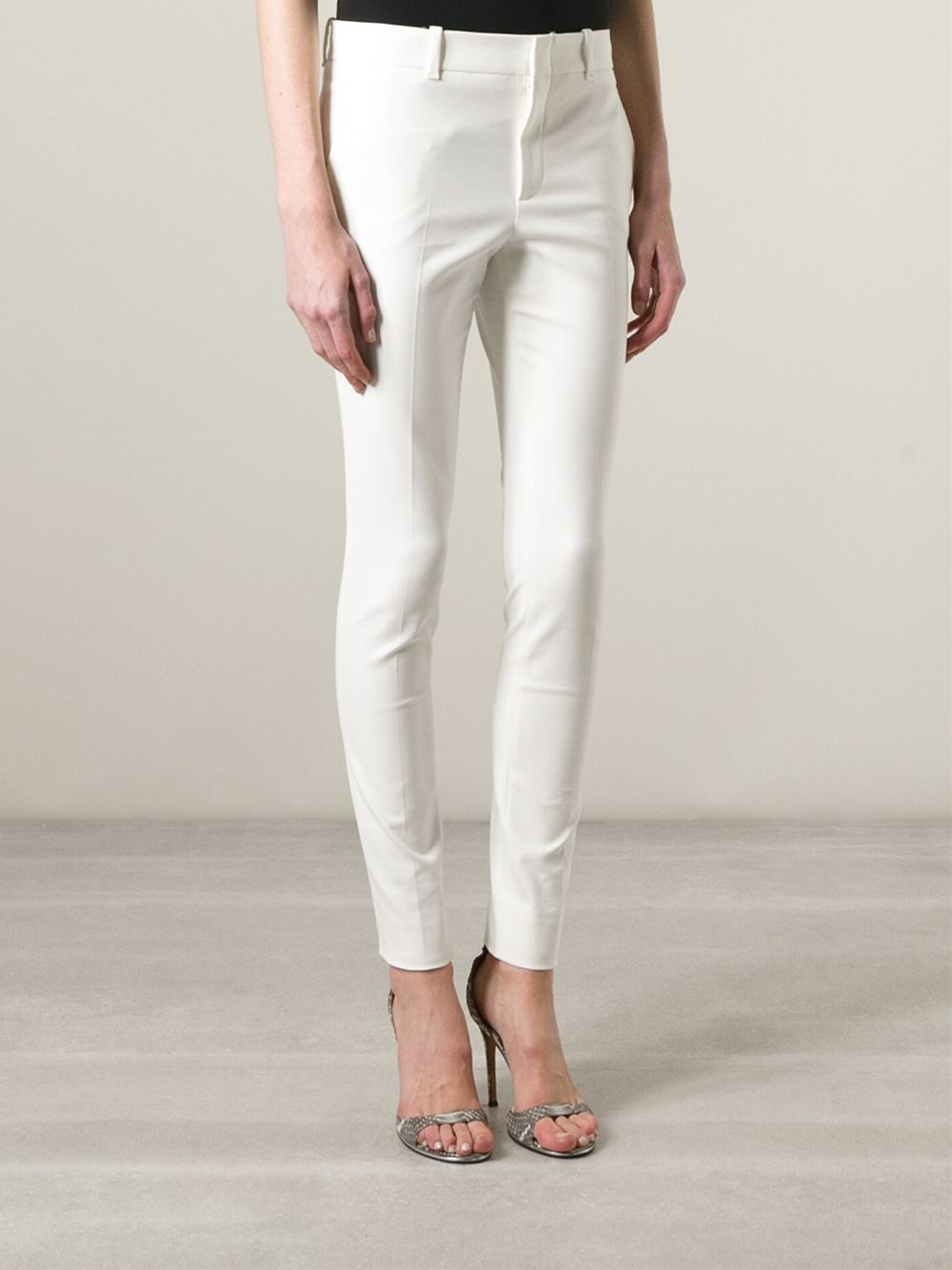 white slim trousers