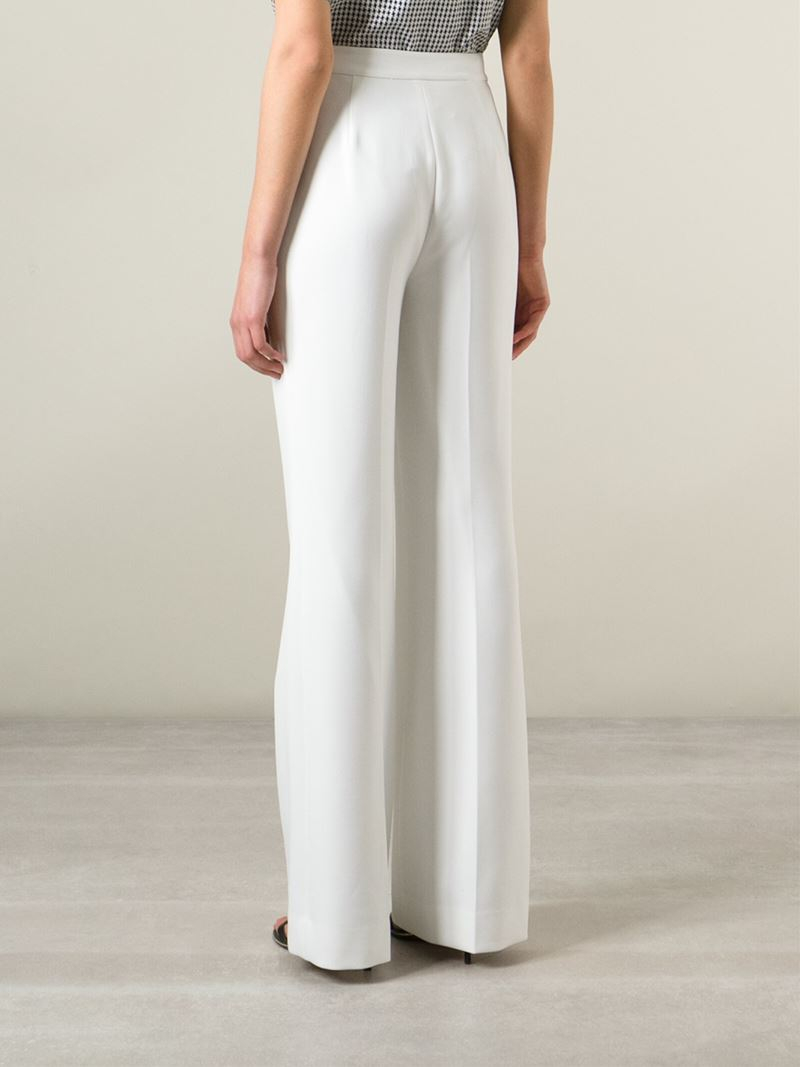 white high waisted flare trousers