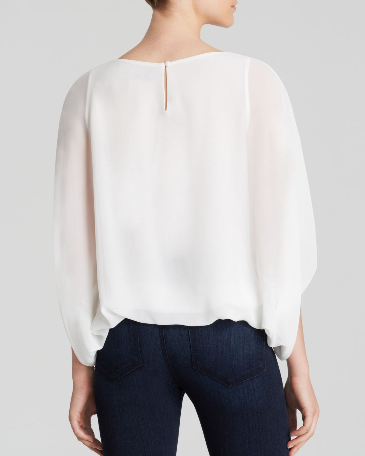 white batwing blouse