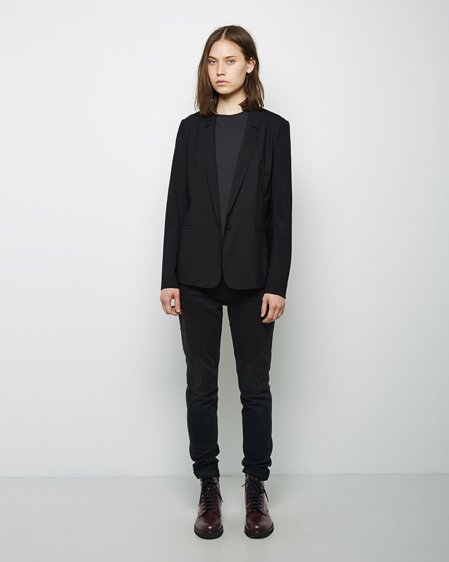 woman by common projects combat boots