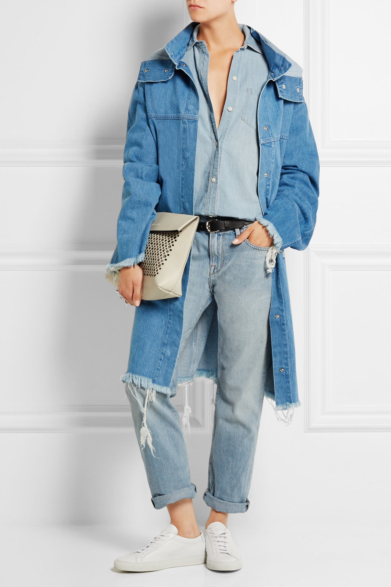 It's free shipping made easy DAZE HOODED DENIM TRUCKER JACKET Designed with an oversized silhouette, Denim x Alexander Wang's Daze hooded trucker jacket is composed of black cotton denim .