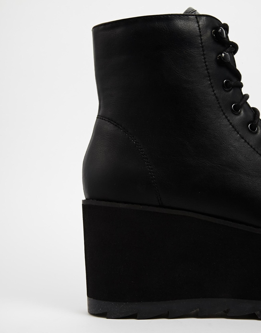 black platform boots flat