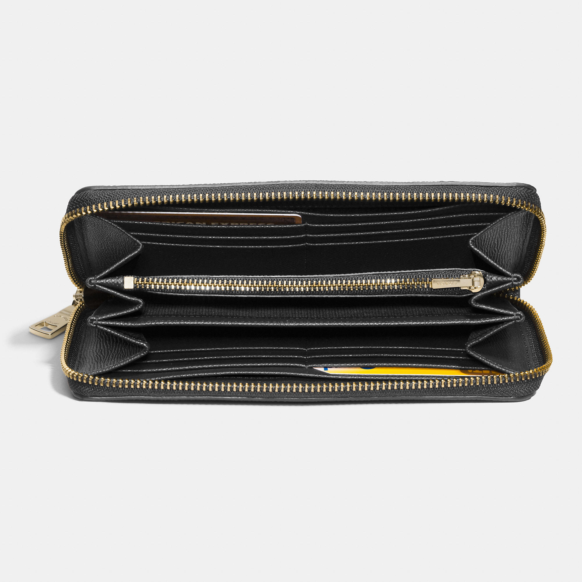 coach wallets blacklight