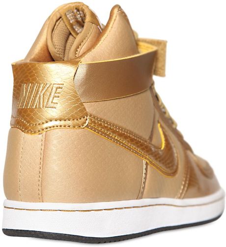 gold nike high tops