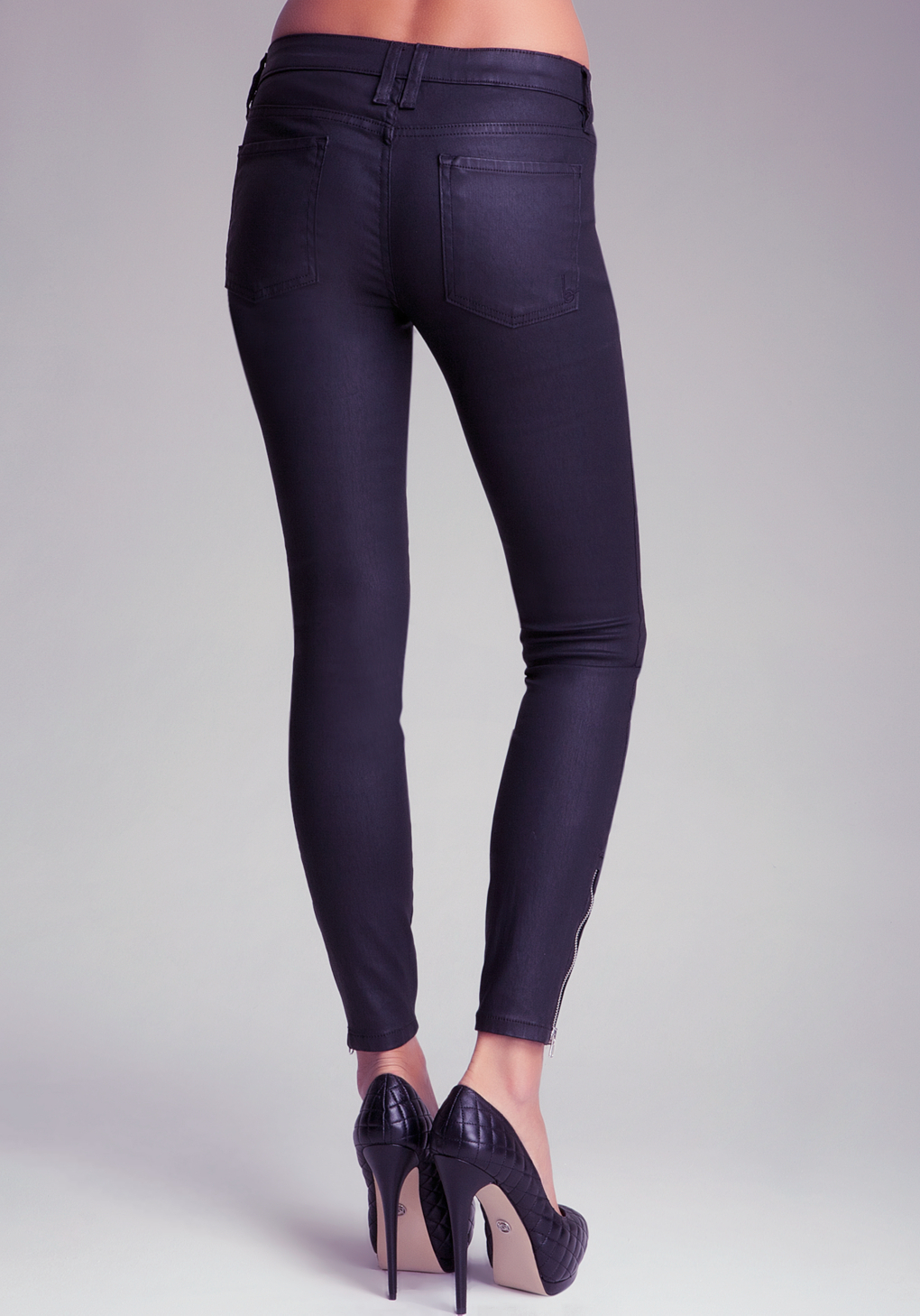 Lyst - Bebe Coated Zipper Skinny Jeans in Purple