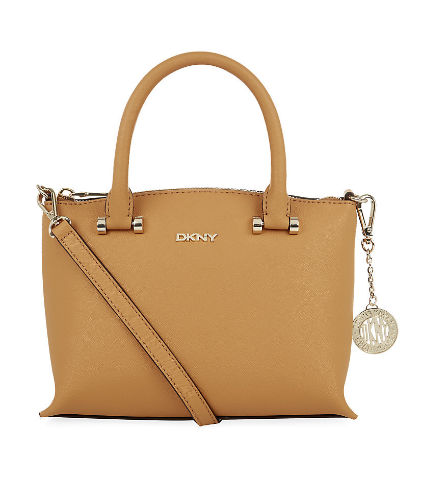 Dkny Mini Saffiano Trapeze Cross Body Bag in Yellow Lyst