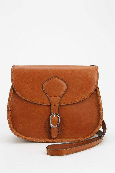 Urban Outfitters Whipstitch Crossbody Saddle Bag in Brown | Lyst