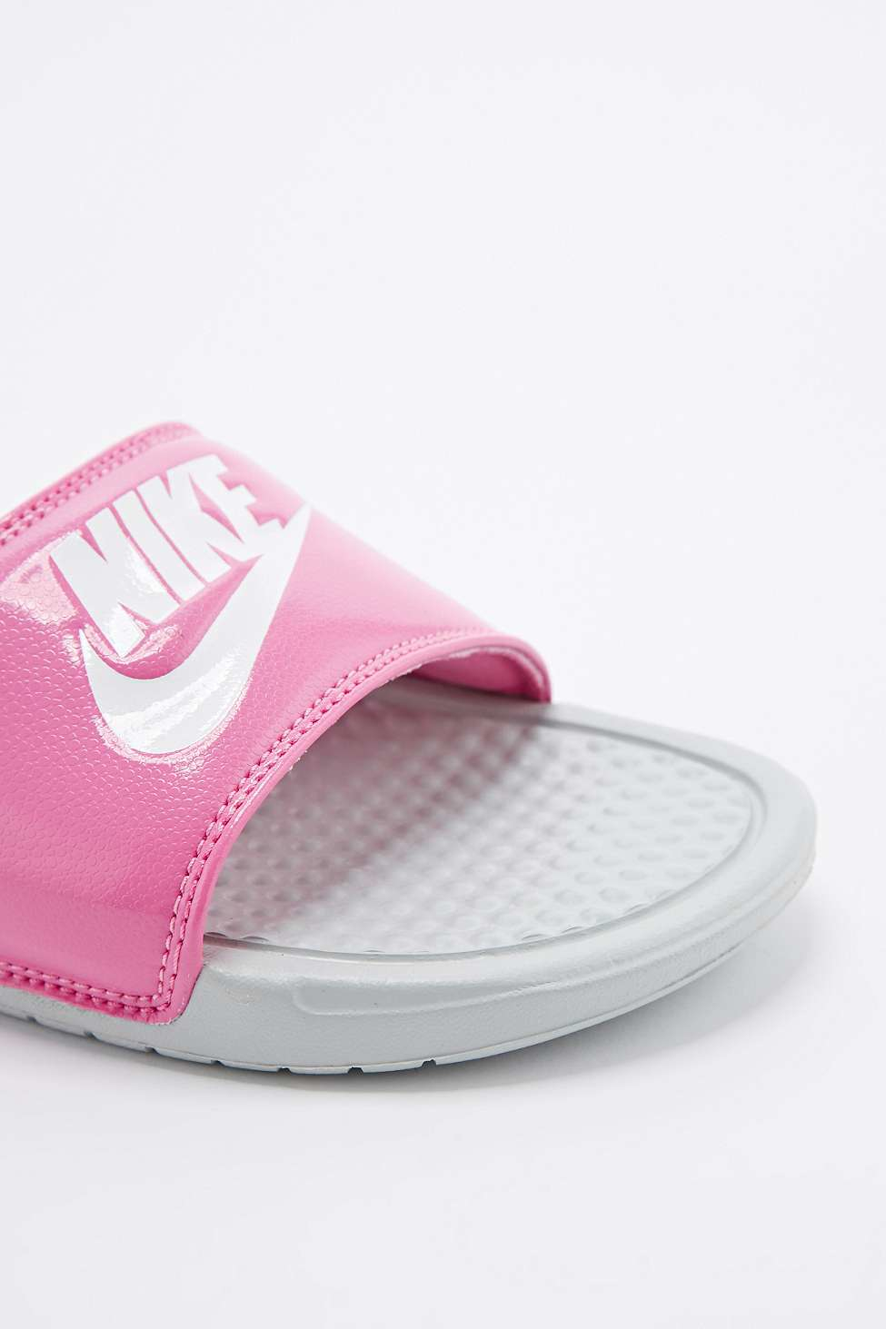 slide sneakers with white and pink upper