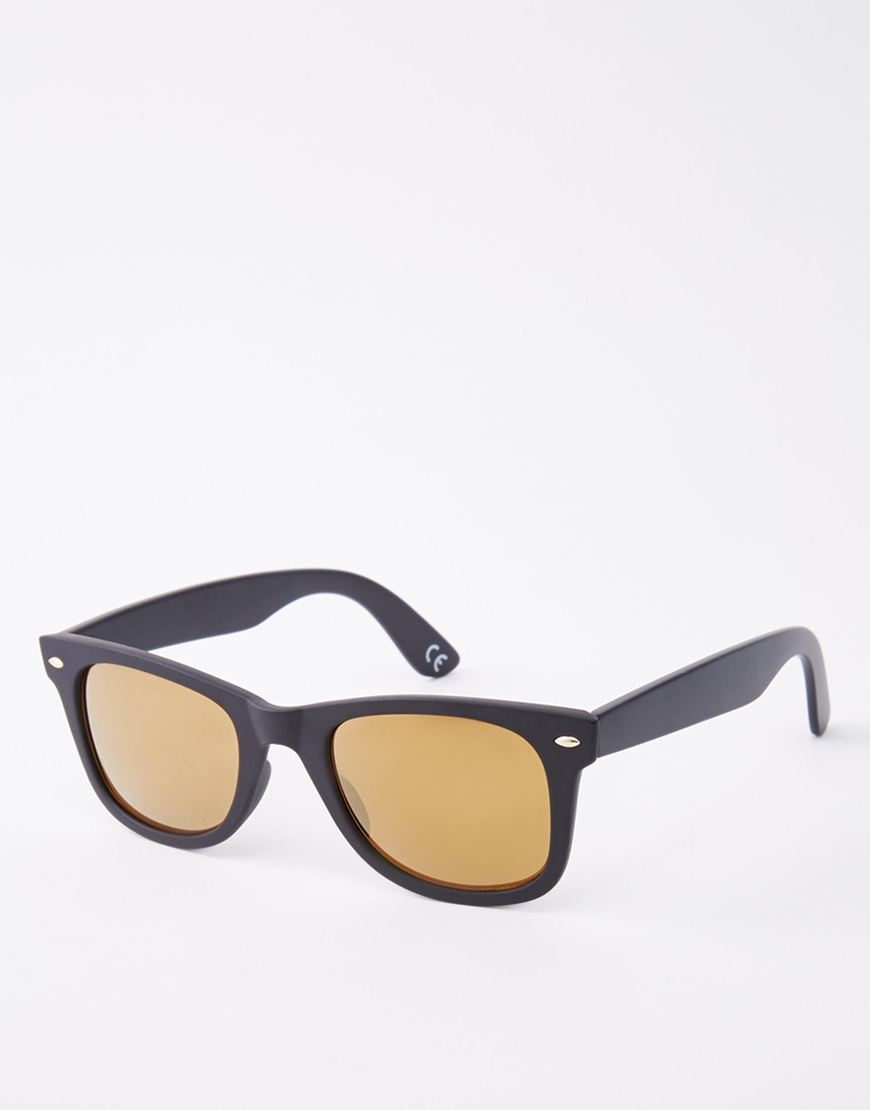 black sunglasses with gold lenses