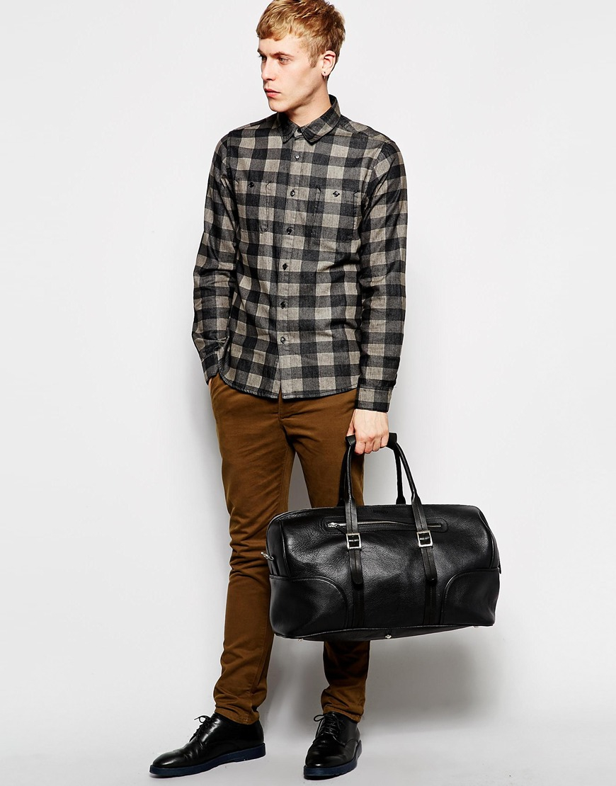 black leather holdalls