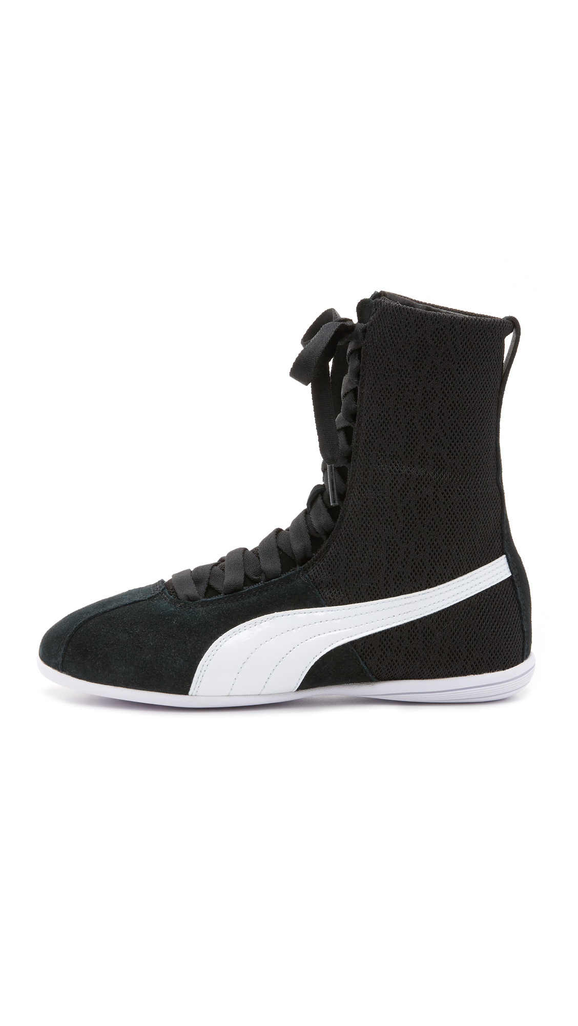 PUMA Eskiva High Top Textured Sneakers in Black | Lyst