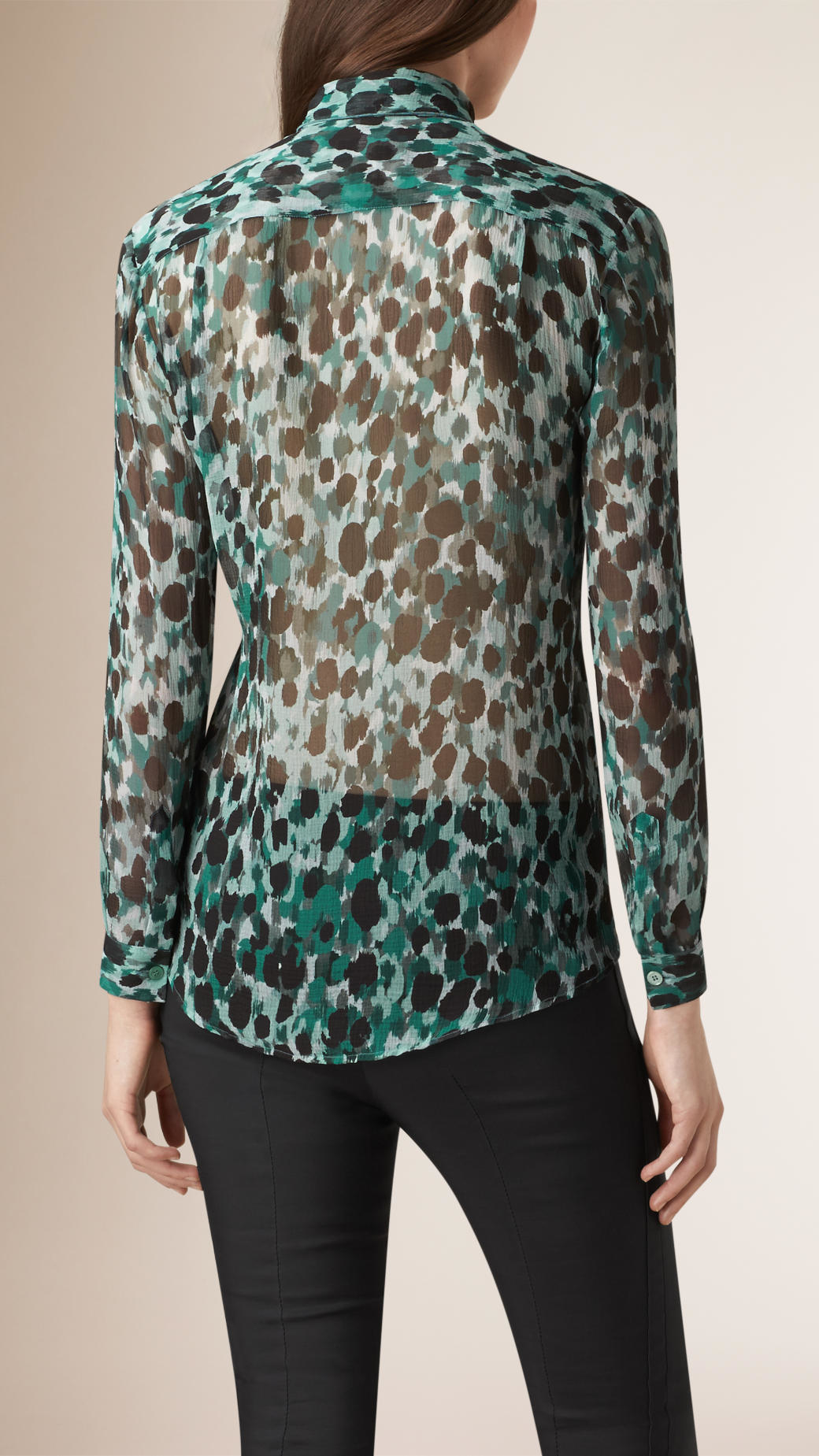 green patterned blouse