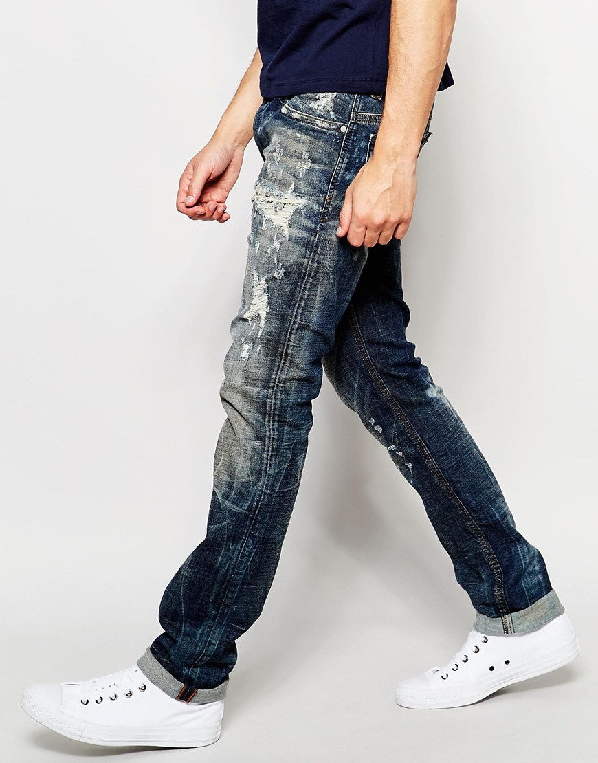 Wapenstilstand Kelder Buigen DIESEL Jeans Thavar 830k Dna Slim Fit Stretch Extreme Rips Bleach in Blue  for Men | Lyst