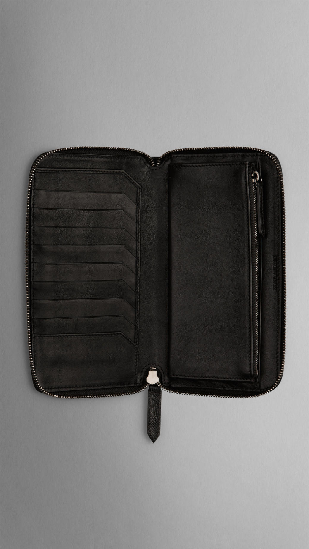 Burberry Embossed Check Leather Ziparound Wallet in Black for Men Lyst