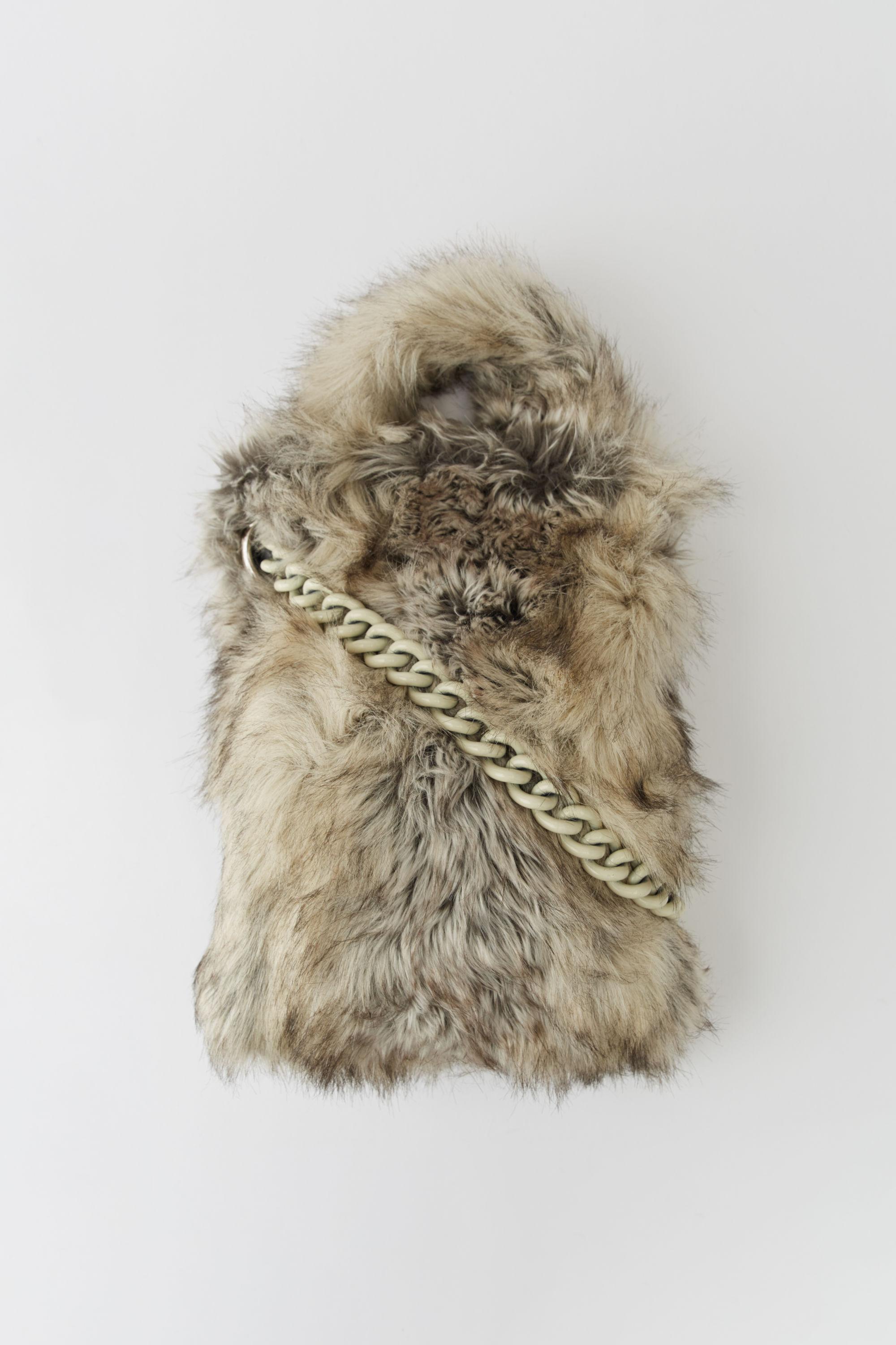 grey fur bag