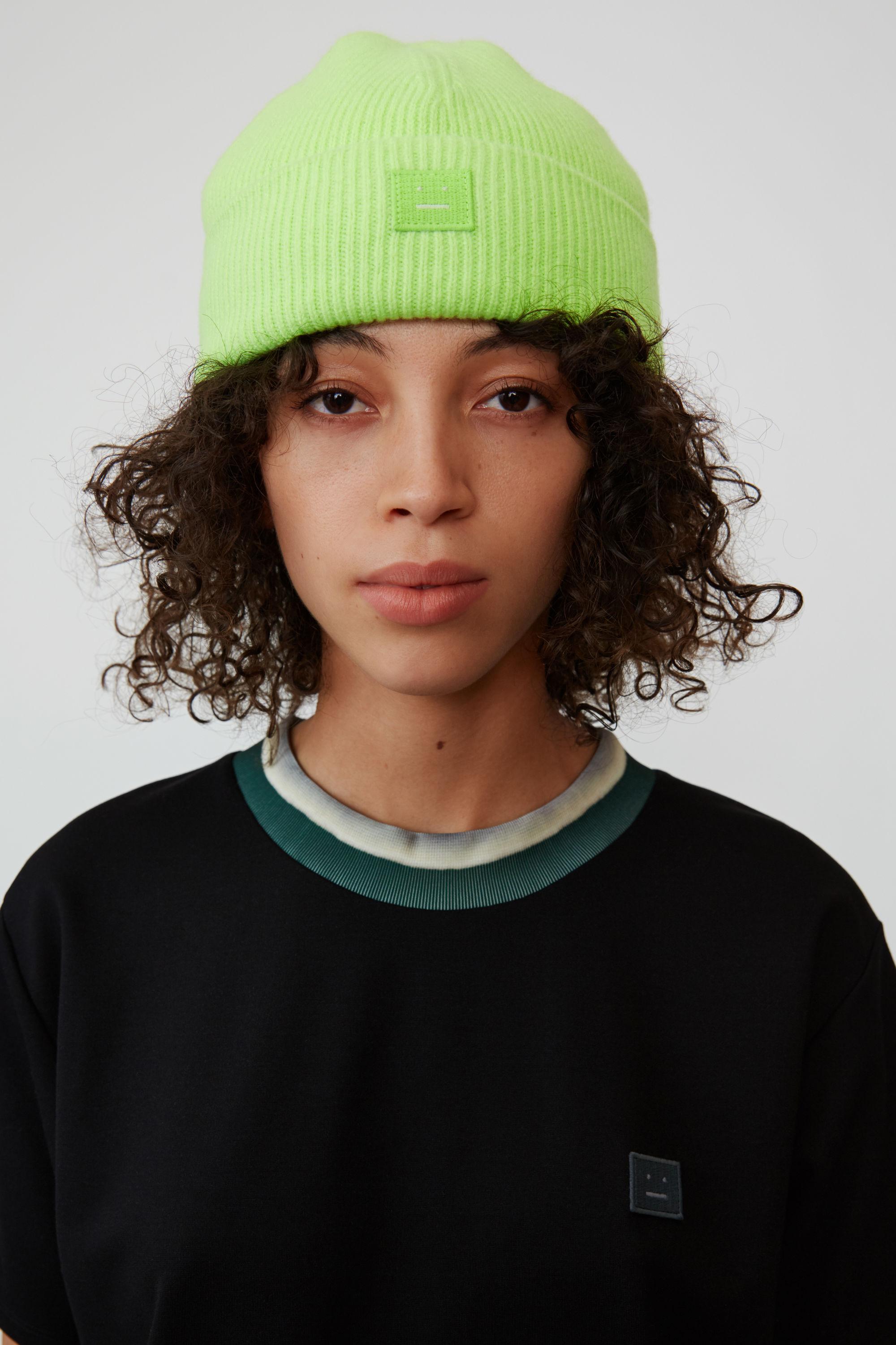 lime green bobble hat