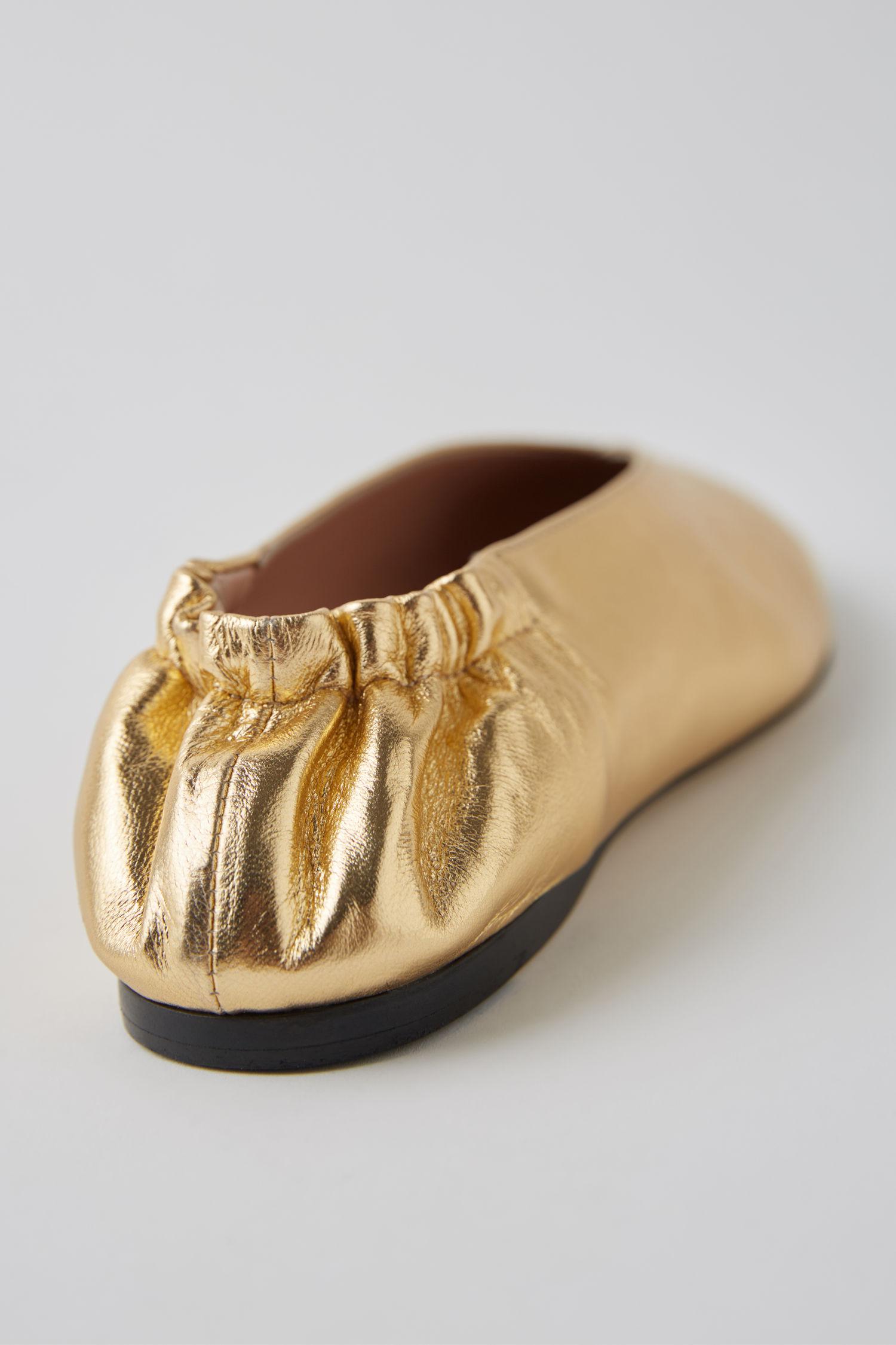 gold ballerina shoes